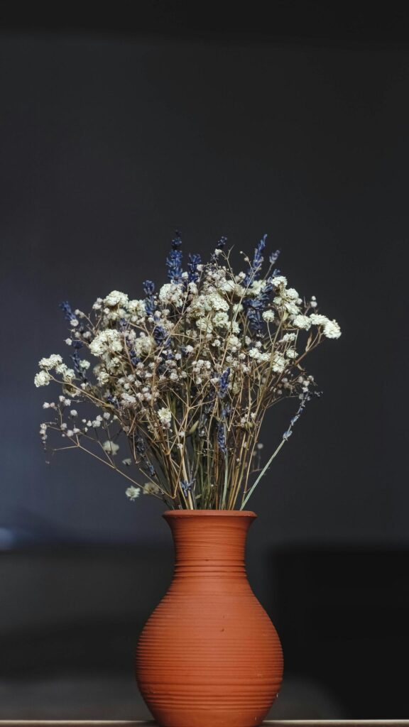 Rustic Dried Lavender and Baby's Breath Bouquet in Clay Vase Wallpaper