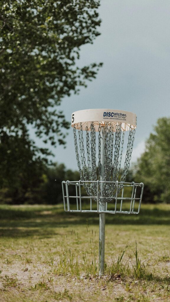 Disc Golf Basket Target on Sunny Day Phone Wallpaper