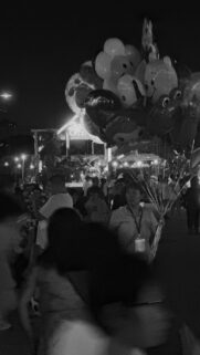 Night Carnival Balloon Seller Street Scene Phone Wallpaper