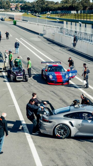 High-Octane Porsche Racing Pit Stop Mobile Phone Wallpaper