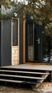 Minimalist Modern Black Cabin Exterior Forest Phone Wallpaper