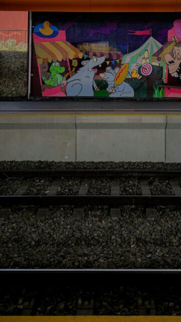 Vibrant Carnival Rat Mural Railway Street Art Mobile Wallpaper