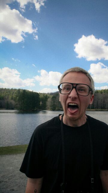 Funny Guy Expressing Surprise Portrait Mobile Wallpaper