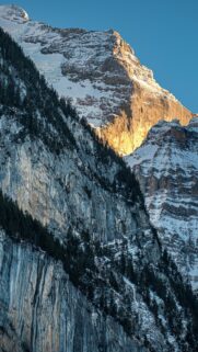 Stunning Golden Sunlit Mountain Peak Snow Covered Winter Alpine Wallpaper