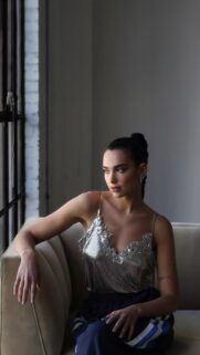 Stunning Dua Lipa Portrait in Shimmering Silver Top Mobile Wallpaper