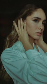 Stunning Close-up Portrait of a Beautiful Young Woman Phone Wallpaper