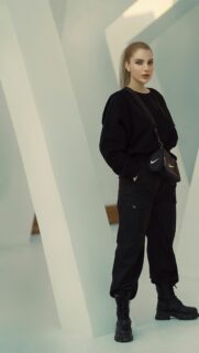 Chic Woman in Techwear Street Style Outfit 4K Mobile Wallpaper