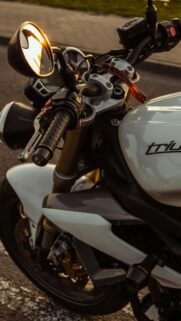 Close-up Triumph Motorcycle Sunset Ride 4K Mobile Wallpaper