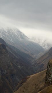 Dramatic Misty Caucasus Mountain Valley Phone Wallpaper