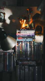 Vintage Cinema Shelf with Godzilla Collectibles Mobile Wallpaper