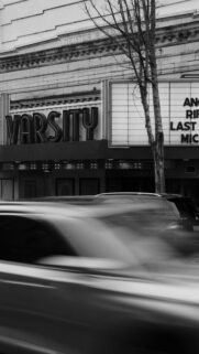 Varsity Theater Building Black and White City Street Photography Wallpaper