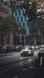 Urban Traffic Street Scene at Dusk Mobile Wallpaper