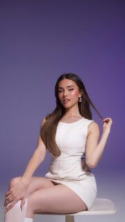 Madison Beer Stunning White Dress Portrait Wallpaper for Mobile