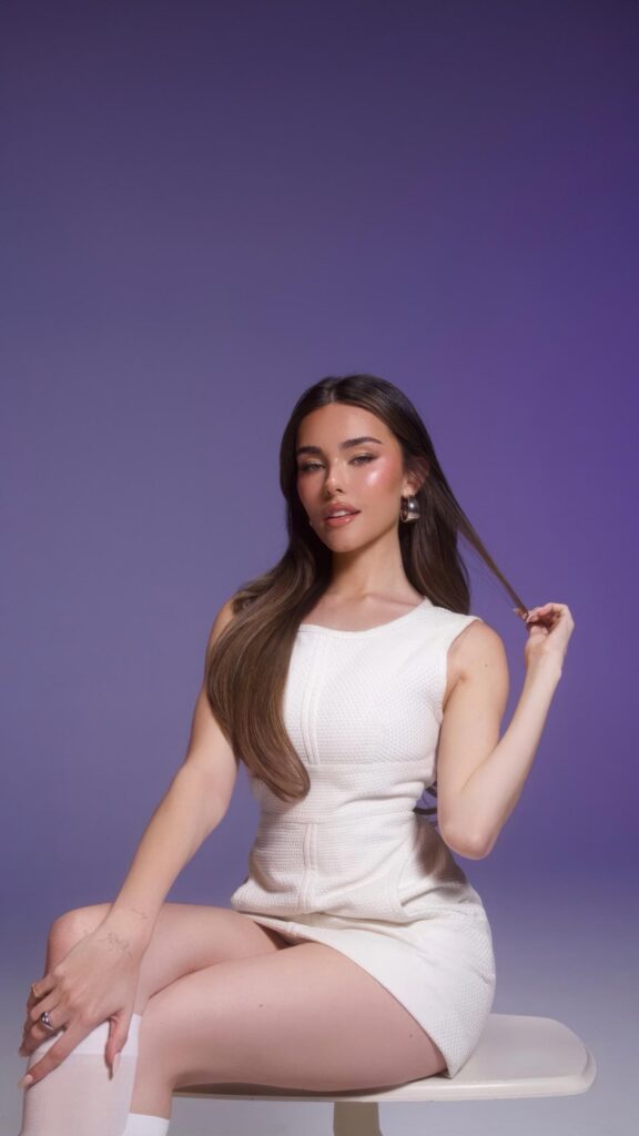 Madison Beer Stunning White Dress Portrait Wallpaper for Mobile