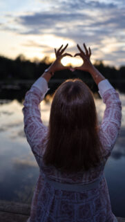 Manifesting Love and Self-Compassion Heart Hands Spiritual Wallpaper