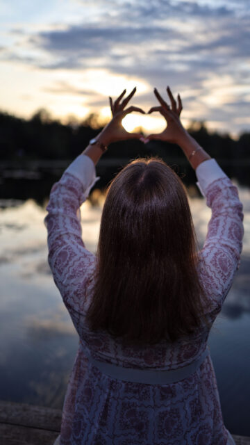 Manifesting Love and Self-Compassion Heart Hands Spiritual Wallpaper