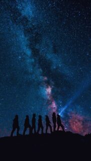Celestial Stargazing Silhouette and Milky Way Manifestation Wallpaper