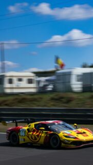 Yellow and Red Ferrari 296 GT3 Racing Car Speed Wallpaper