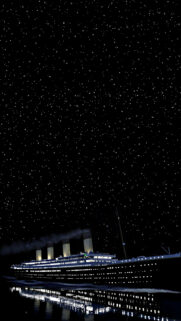 Illuminated Cruise Ship Under Starry Night Mobile Wallpaper