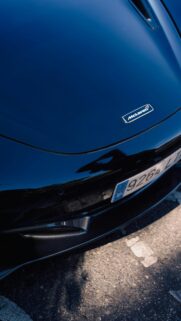 Sleek Black McLaren Sports Car Close-up Mobile Wallpaper