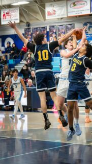 Dynamic High School Basketball Game Action Shot Wallpaper
