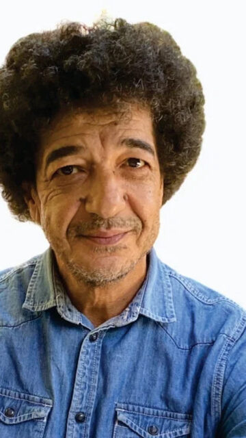 Portrait of a Middle-Aged Man with an Afro Mobile Wallpaper