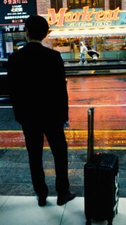 Lonely Traveler Waiting for a Ride City Night Street Aesthetic Wallpaper