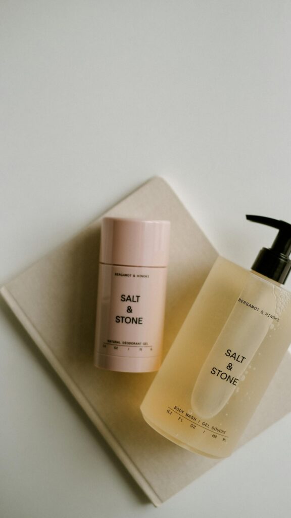 Minimalist Salt & Stone Bergamot & Hinoki Skincare Flat Lay Wallpaper