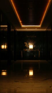 Luxury Minimalist Hallway with Ambient Warm Lighting Phone Wallpaper