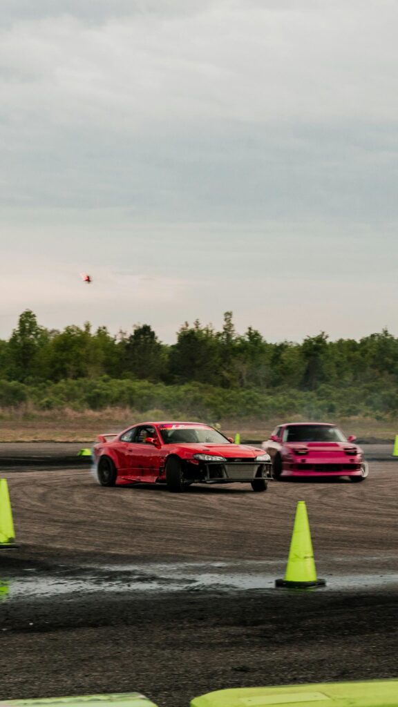 Red and Pink JDM Drift Cars Track Action Phone Wallpaper