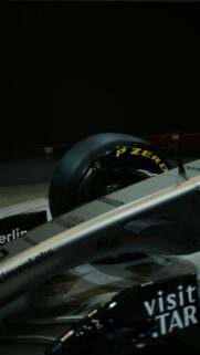 Sleek Silver Formula 1 Racing Car Close-Up Mobile Wallpaper