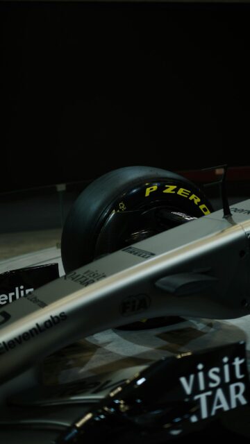 Sleek Silver Formula 1 Racing Car Close-Up Mobile Wallpaper