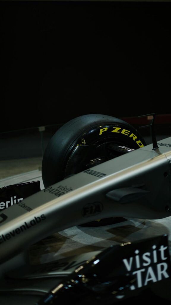 Sleek Silver Formula 1 Racing Car Close-Up Mobile Wallpaper