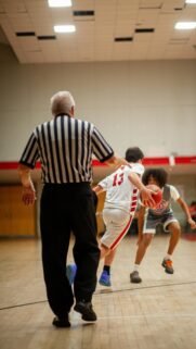 Dynamic Basketball Game Action Shot HD Phone Wallpaper