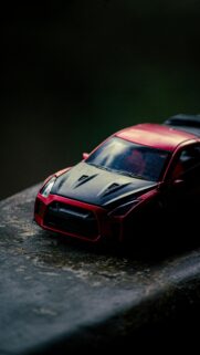 Red Nissan GT-R R35 Diecast Model Car Aesthetic Smartphone Wallpaper