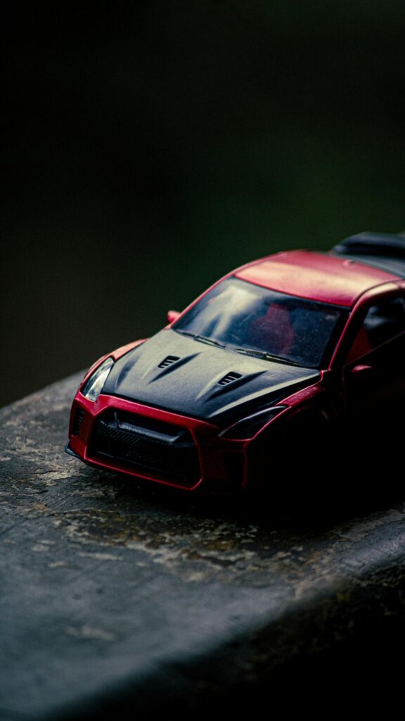 Red Nissan GT-R R35 Diecast Model Car Aesthetic Smartphone Wallpaper