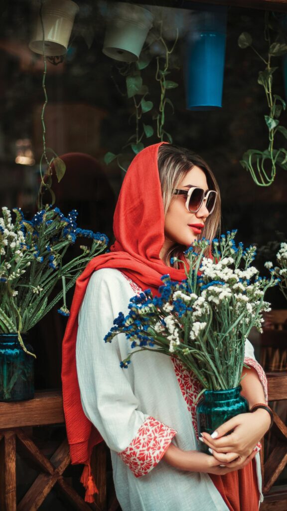Stunning Woman with Flowers and Red Scarf Aesthetic Mobile Wallpaper