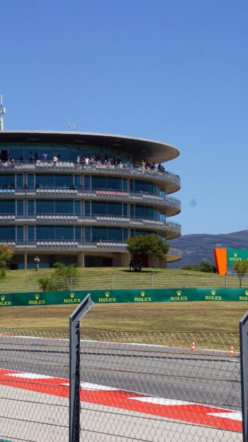 Modern Formula 1 Racing Paddock Circuit Grandstand Mobile Wallpaper