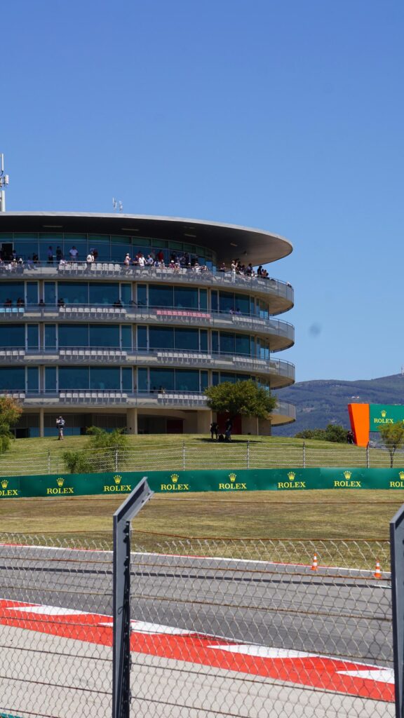 Modern Formula 1 Racing Paddock Circuit Grandstand Mobile Wallpaper