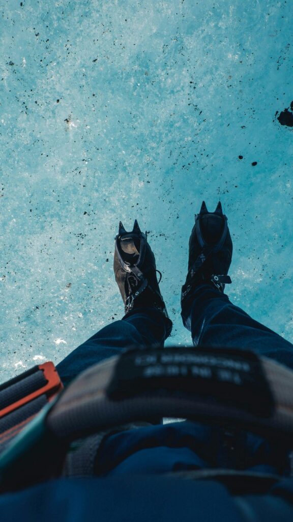 First-Person Glacier Trekking Adventure Mobile Wallpaper