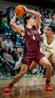 Intense High School Basketball Game Action Shot Mobile Wallpaper