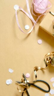 Festive Gift Wrapping and Gold Ribbon Flat Lay Phone Wallpaper