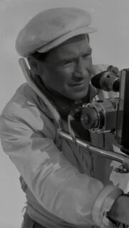 Vintage Cinematic Photographer Capturing Memories Mobile Wallpaper