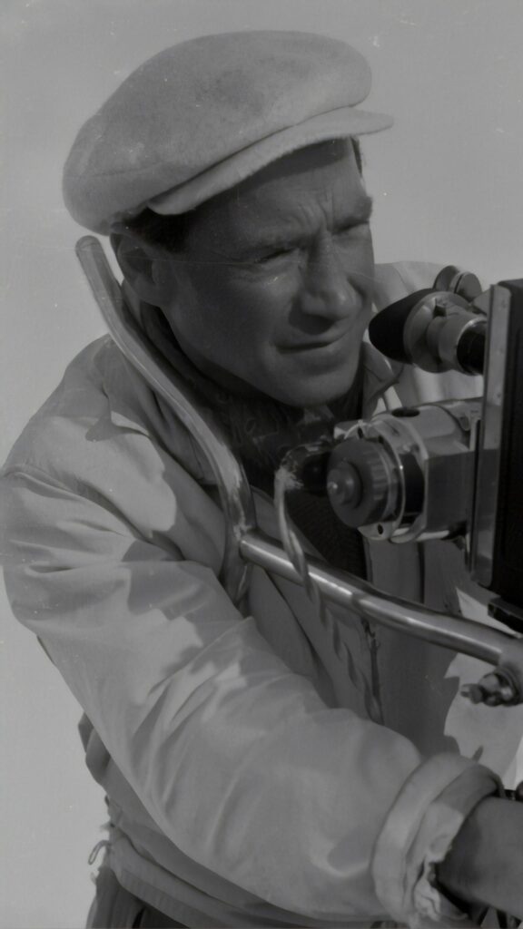 Vintage Cinematic Photographer Capturing Memories Mobile Wallpaper