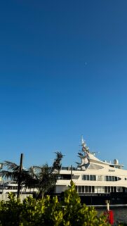 Luxury Mega Yacht At Sunset With Crescent Moon Mobile Wallpaper