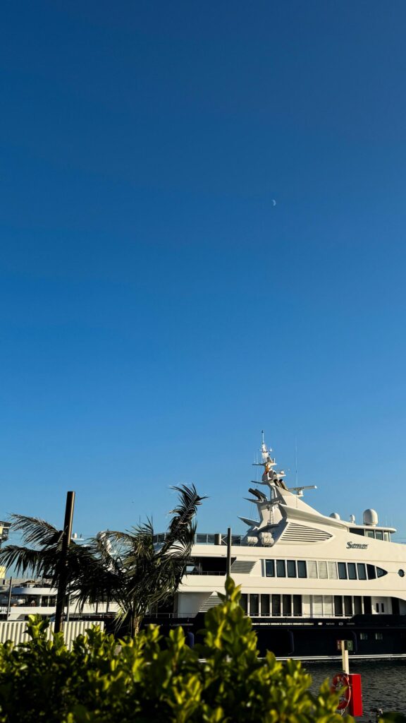 Luxury Mega Yacht At Sunset With Crescent Moon Mobile Wallpaper