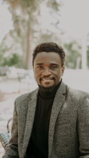 Handsome Black Man in Tweed Blazer Portrait Mobile Wallpaper