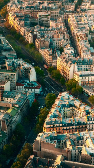 Breathtaking Aerial View of Parisian Streets at Golden Hour Wallpaper