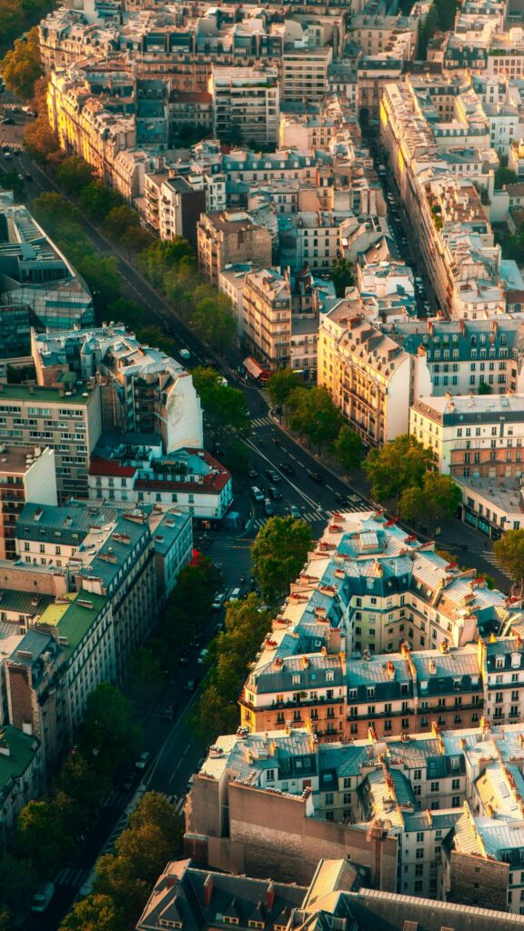 Breathtaking Aerial View of Parisian Streets at Golden Hour Wallpaper