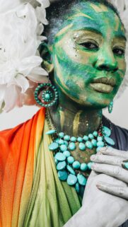 Fantasy Goddess with Green Face Paint and Turquoise Jewelry Mobile Wallpaper
